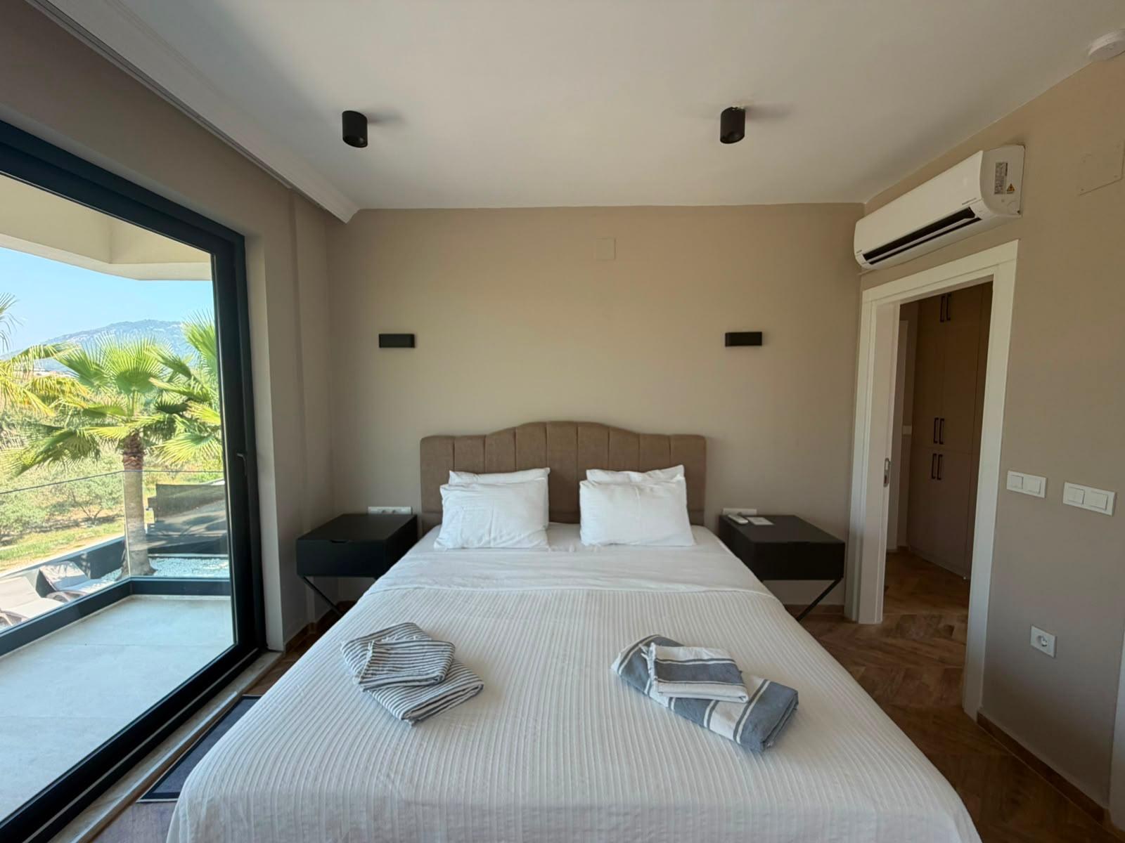 Bedroom 3 with wardrobe and balcony door