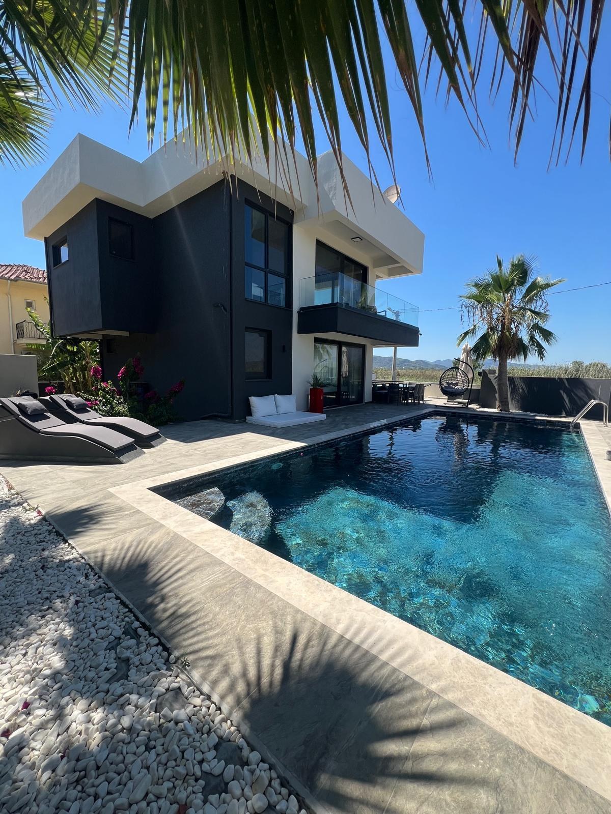 Private pool and villa, daylight view